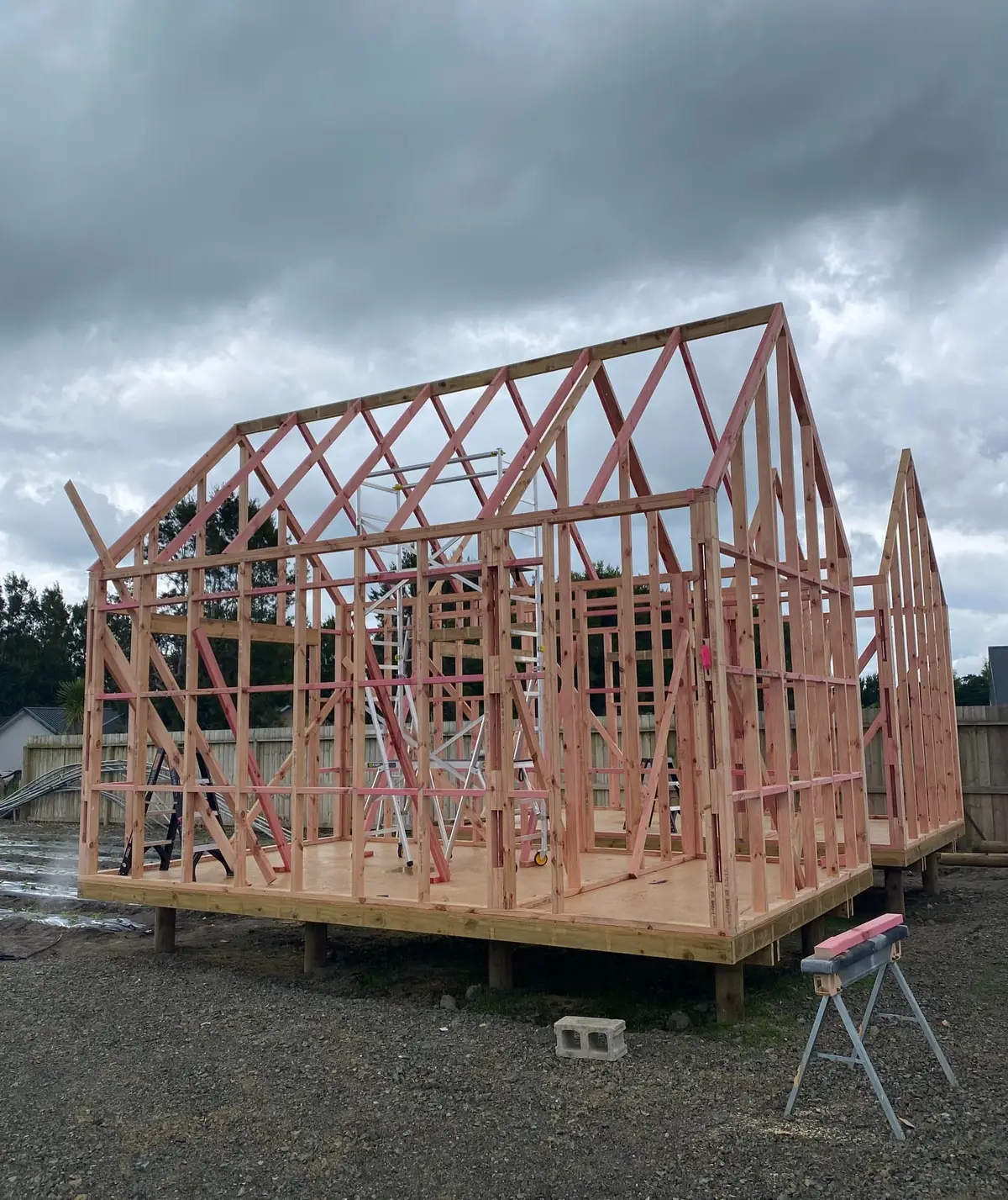 Timber framing and roof trusses on a new home under construction